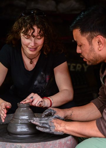 Sajan Prajapati teaches visitors how to shape clay at Pottery Square, Bhaktapur. Photo: Pratikshya Bhatta